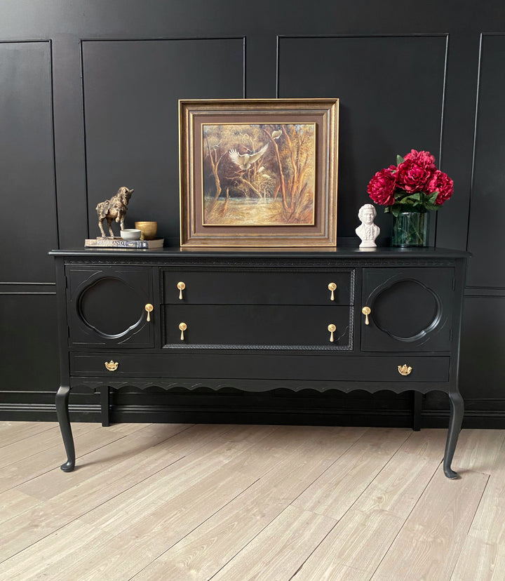 Elegant black sideboard with gorgeous brass drop handles